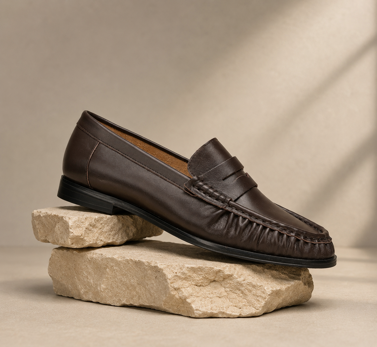 Dark brown leather loafer manufactured by Levin Shoes